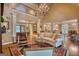 Open concept living room with hardwood floors, and a wall of windows for lots of natural light at 223 Old Rome Rd, Kingston, GA 30145