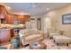 Inviting living room features a cozy seating area and a seamless transition to a well-equipped kitchen with stainless appliances at 223 Old Rome Rd, Kingston, GA 30145