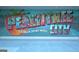 Colorful mural showcasing 'Greetings from Peachtree City,' promoting local charm and attractions at 110 Long Leaf, Peachtree City, GA 30269