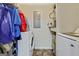 Functional laundry room with a washer, dryer, and storage space at 12303 Waldrop Pl, Decatur, GA 30034