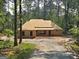 New construction home in a wooded area, featuring a simple design and natural surroundings at 2043 Fischer Rd, Sharpsburg, GA 30277