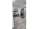 Spacious kitchen showcasing stainless steel appliances, gray cabinets, and durable flooring at 4059 Canby Ln, Decatur, GA 30035