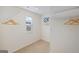 Walk-in closet offering ample shelving, hanging storage, and natural light from a window at 5455 Baybrook Cir, South Fulton, GA 30349