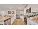 Modern kitchen with stainless steel appliances, granite countertops, and white cabinetry at 5455 Baybrook Cir, South Fulton, GA 30349