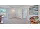 Bright loft area with neutral walls, carpeted floors, and natural light, perfect for relaxation at 5455 Baybrook Cir, South Fulton, GA 30349