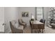 Cozy home office with a wooden desk, comfortable seating, and a decorative world map at 5455 Baybrook Cir, South Fulton, GA 30349