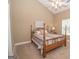 Comfortable bedroom with four-poster bed and natural light at 482 N Jeff Davis Dr, Fayetteville, GA 30214