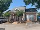 Attractive brick clubhouse with well maintained landscaping at 482 N Jeff Davis Dr, Fayetteville, GA 30214