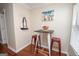 Cozy dining area with modern table, seating, and decorative artwork at 482 N Jeff Davis Dr, Fayetteville, GA 30214