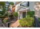 Well-maintained home featuring manicured landscaping and a welcoming entrance at 482 N Jeff Davis Dr, Fayetteville, GA 30214