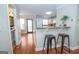 Open kitchen with breakfast bar, granite countertops, and modern fixtures at 482 N Jeff Davis Dr, Fayetteville, GA 30214