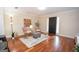 Cozy living room with hardwood floors, ample natural light, and stylish decor at 482 N Jeff Davis Dr, Fayetteville, GA 30214