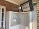 Mailboxes in a brick enclosure with community meeting announcements displayed above at 482 N Jeff Davis Dr, Fayetteville, GA 30214