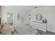 Bright and open primary bedroom with a large dresser and a door leading to another room at 5451 Baybrook Cir, South Fulton, GA 30349