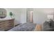 Spacious bedroom featuring soft bedding, modern decor, and ample natural light at 5451 Baybrook Cir, South Fulton, GA 30349