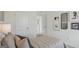 Baseball themed bedroom with a comfortable bed with pillows and view of the hallway at 5451 Baybrook Cir, South Fulton, GA 30349