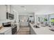 Modern kitchen with sleek countertops, stainless steel appliances, and an open design at 5451 Baybrook Cir, South Fulton, GA 30349