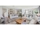 Open-concept living space seamlessly connects the living room, kitchen, and dining area for easy entertaining at 5451 Baybrook Cir, South Fulton, GA 30349