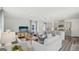 Spacious living area featuring modern furnishings, neutral tones, and a seamless flow to the kitchen area at 5451 Baybrook Cir, South Fulton, GA 30349
