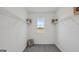 Walk-in closet with shelves, a window, and a woven basket for neat storage at 5451 Baybrook Cir, South Fulton, GA 30349