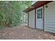 Backyard featuring green space with a door leading into the house at 212 Garret Rdg, Peachtree City, GA 30269