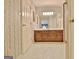 Bathroom vanity features cabinet storage and a large mirror with lighting at 212 Garret Rdg, Peachtree City, GA 30269