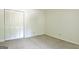 Minimal bedroom with neutral carpet, a large closet, and electric outlets at 212 Garret Rdg, Peachtree City, GA 30269