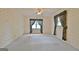 Bedroom featuring patterned wallpaper and natural lighting from windows at 212 Garret Rdg, Peachtree City, GA 30269