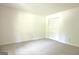 Neutral carpeted bedroom with large closet and bright natural light at 212 Garret Rdg, Peachtree City, GA 30269