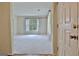 Bright living room with neutral carpet seen from doorway at 212 Garret Rdg, Peachtree City, GA 30269