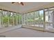 Cozy sunroom with multiple windows offering tranquil views of nature at 212 Garret Rdg, Peachtree City, GA 30269