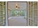Enclosed sunroom with many windows providing panoramic views at 212 Garret Rdg, Peachtree City, GA 30269