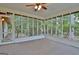 Bright sunroom with scenic views through the surrounding screened windows at 212 Garret Rdg, Peachtree City, GA 30269
