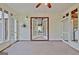 Well-lit sunroom with views into main house and access to exterior at 212 Garret Rdg, Peachtree City, GA 30269