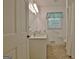 Bathroom features a toilet, vanity and sink with natural light at 501 Bridlepath Ln, Peachtree City, GA 30269