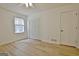 Bedroom with closet and light wood-look floors at 501 Bridlepath Ln, Peachtree City, GA 30269