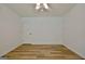 Bright bedroom featuring a ceiling fan and laminate flooring at 501 Bridlepath Ln, Peachtree City, GA 30269