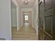 Bright foyer with vinyl floors and visible sightlines to adjacent rooms at 501 Bridlepath Ln, Peachtree City, GA 30269
