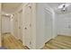 Hallway with new flooring and storage closet at 501 Bridlepath Ln, Peachtree City, GA 30269