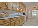 Functional kitchen offering ample cabinet space, updated countertops, and a light-filled breakfast area at 501 Bridlepath Ln, Peachtree City, GA 30269