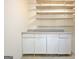 Workshop with countertops and upper storage shelves at 501 Bridlepath Ln, Peachtree City, GA 30269