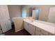 Bright bathroom with a white vanity and a large mirror, perfect for getting ready at 3679 Seabass Rd, Decatur, GA 30034
