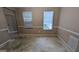 Empty bedroom with two windows at 3679 Seabass Rd, Decatur, GA 30034