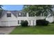 Two-story home featuring a two-car garage, dark shutters, and a symmetrical front design at 3679 Seabass Rd, Decatur, GA 30034