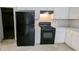 Close-up view of kitchen appliances and counters at 3679 Seabass Rd, Decatur, GA 30034