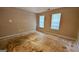 Empty main bedroom with two windows at 3679 Seabass Rd, Decatur, GA 30034