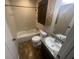 Full bathroom with vanity, granite countertop, sink, bathtub and shower at 120 Creekwood Ln, Fayetteville, GA 30214