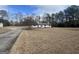 Charming single-story home with a well-maintained lawn and a long driveway at 120 Creekwood Ln, Fayetteville, GA 30214