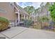 Charming home backyard with a black metal fence and lush green surroundings at 135 Edgewater Trl, Fayetteville, GA 30215