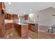 Gourmet kitchen with stainless steel appliances, island, and hardwood floors at 135 Edgewater Trl, Fayetteville, GA 30215
